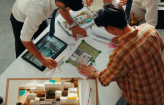 Interior designer reviewing 3D project mo